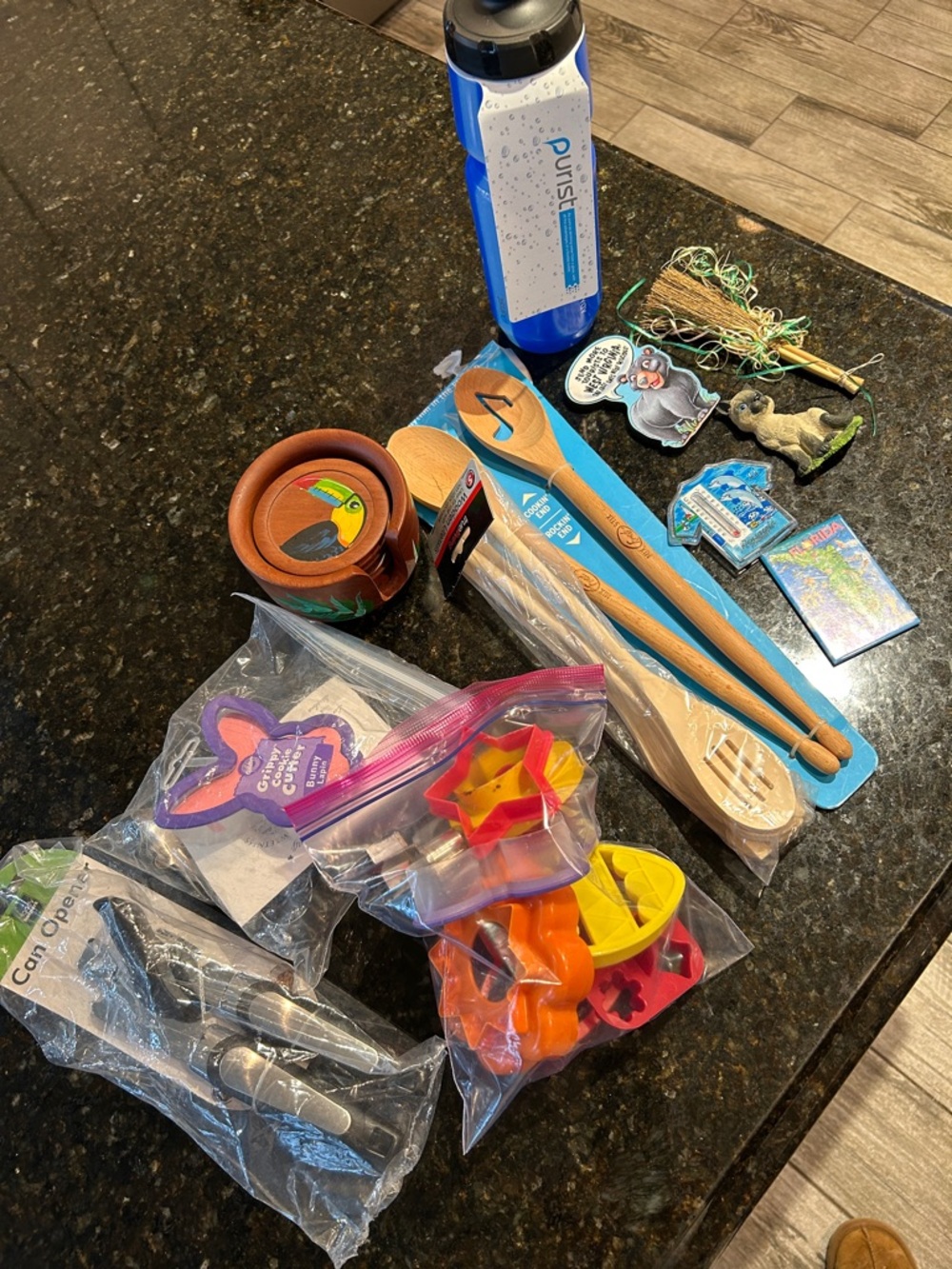 Wooden utensils, can opener, coasters, cookie cutters, fridge magnets